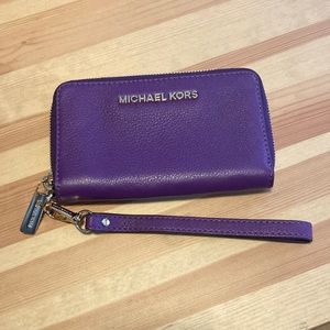 Michael Kors purple leather wristlet wallet